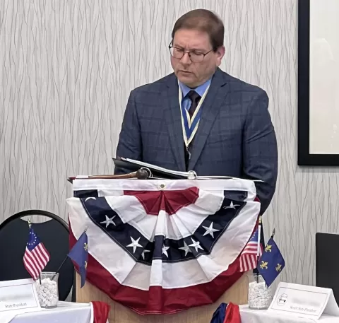 SAR Speaker at an event.  Photo by Len Beverly